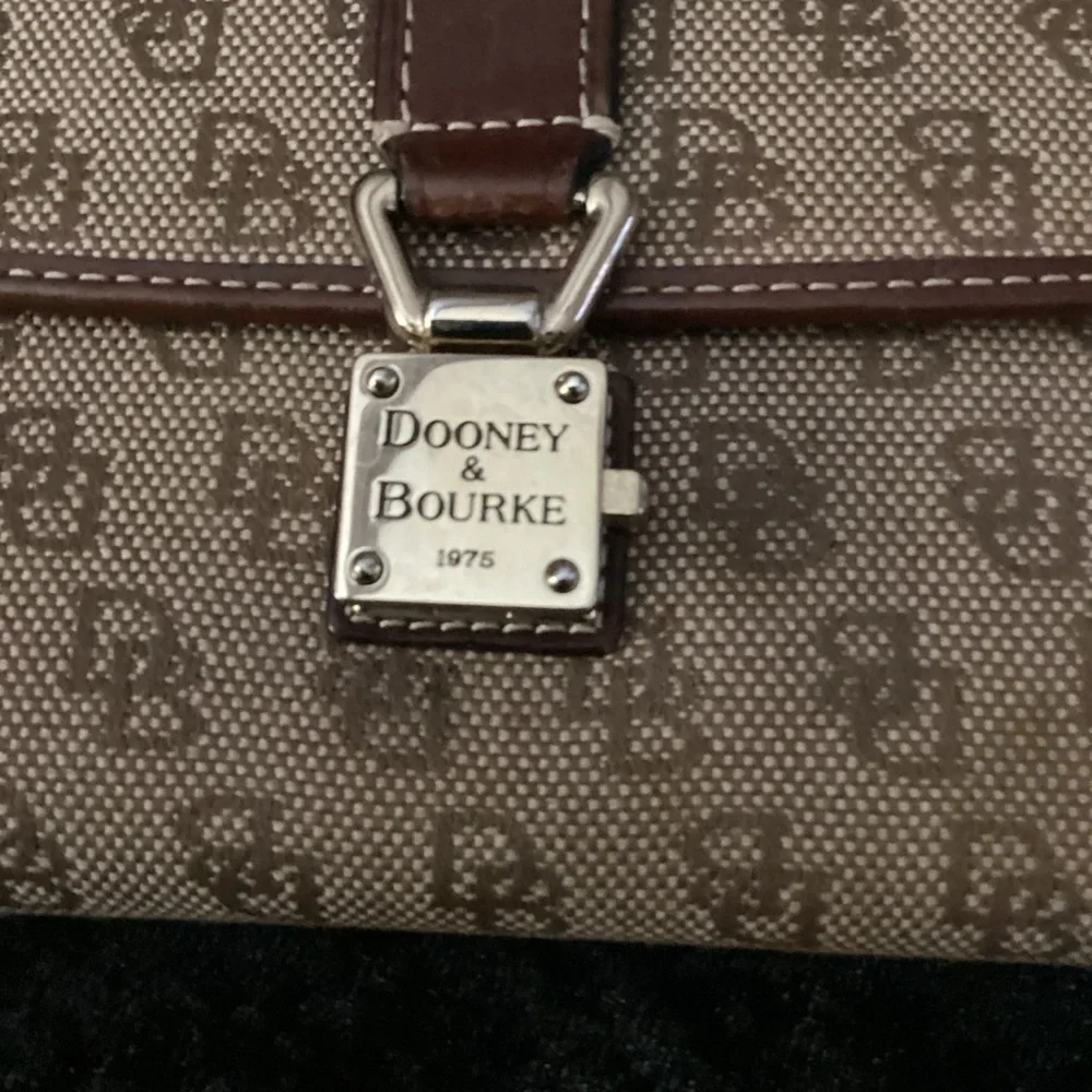 Dooney & Bourke Brown Signature 1975 Continental Wallet with Gold Plaque